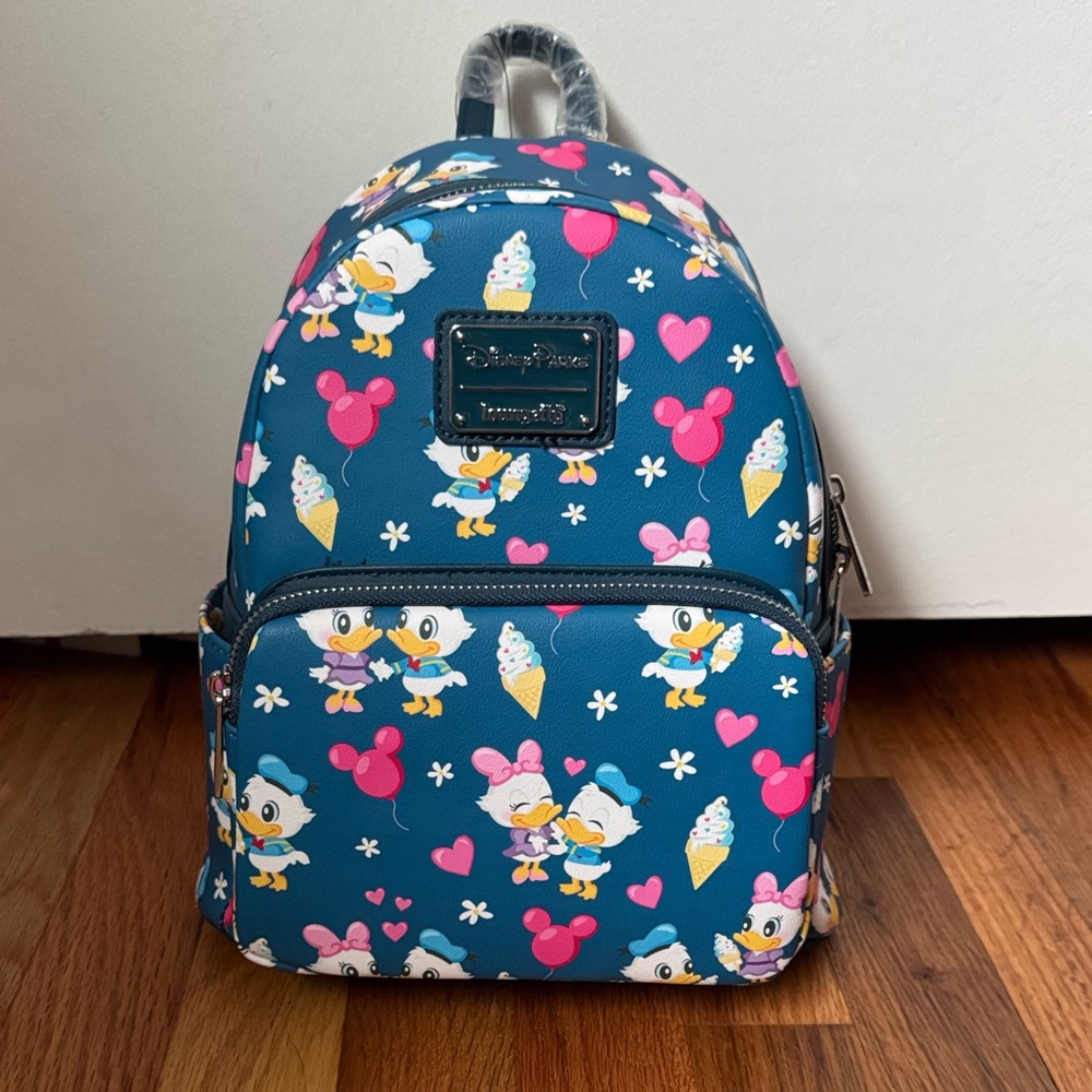 Loungefly Blue and Pink Disney Backpack